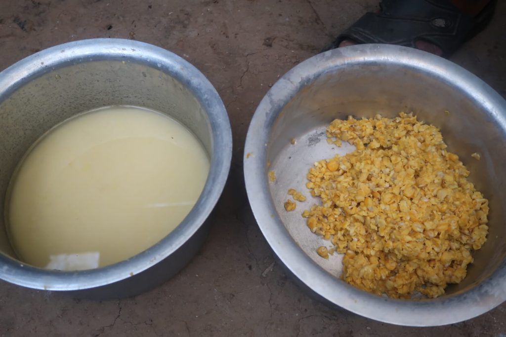 The liquid on the left, drained from the maize, is now ready to serve.